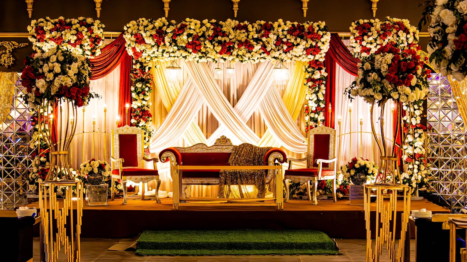 Decorated celebration stage with drapery for dramatic reveal and entrance moments