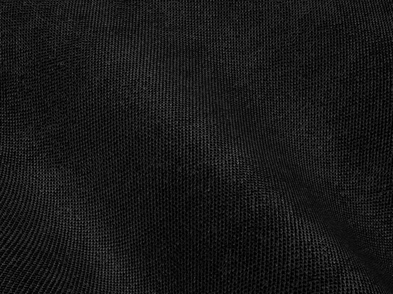 Black fabric texture representing blackout and masking drape rental